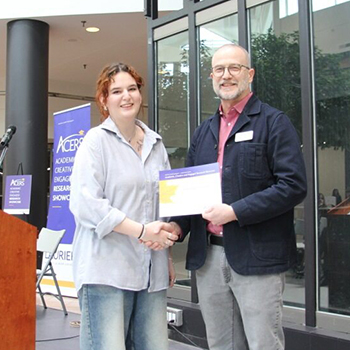 ACERS 1st place podcast winner Jasmine Cossette and Vice President: Research Jonathan Newman