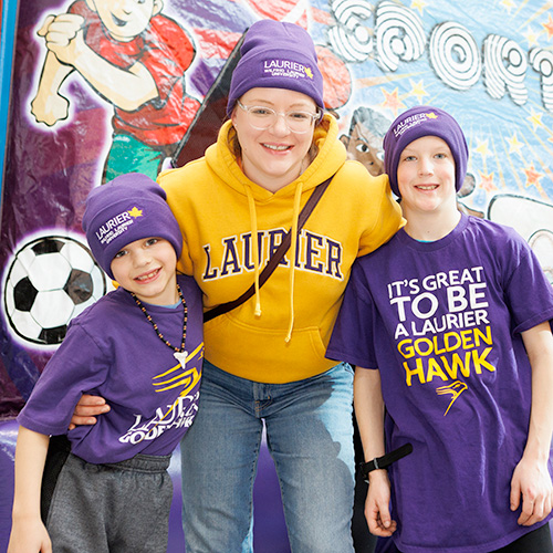 Family at Laurier Brantford Purple and Gold Party